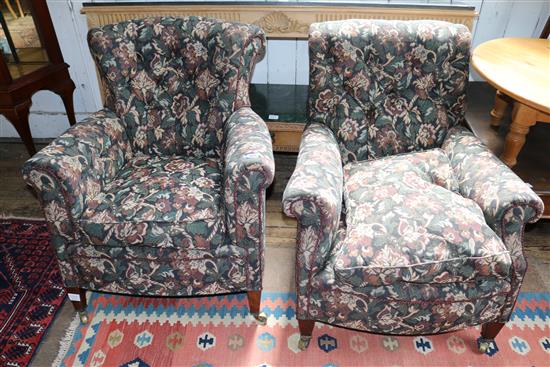 A pair of Edwardian upholstered armchairs